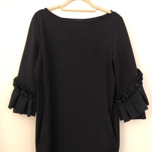 Navy Ruffle sleeve mini-dress.